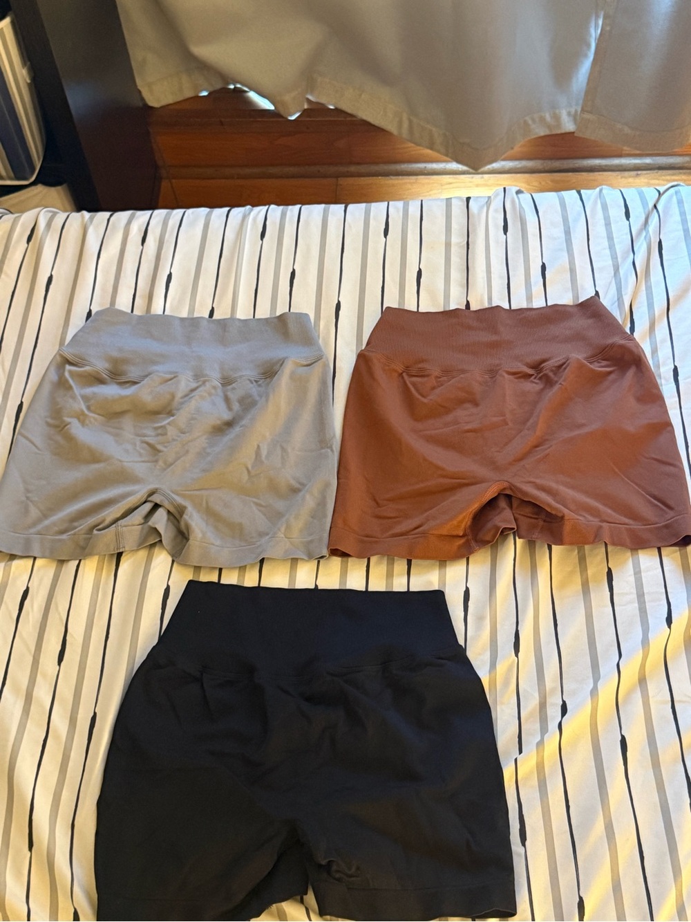 3 pair of shorts bundle; includes black, gray, & brown